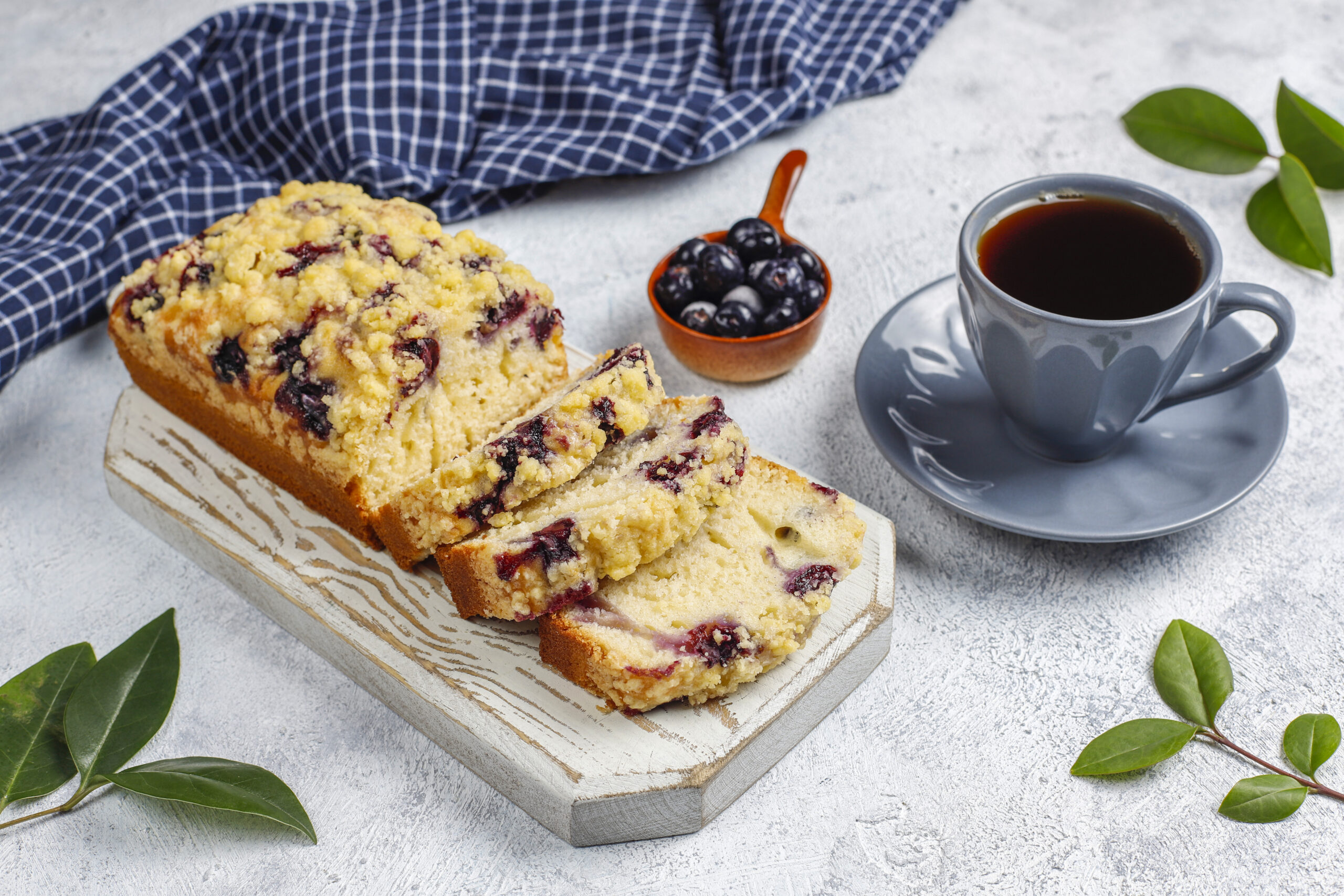 Homemade delicious blueberry crumble cake with frozen blueberrie